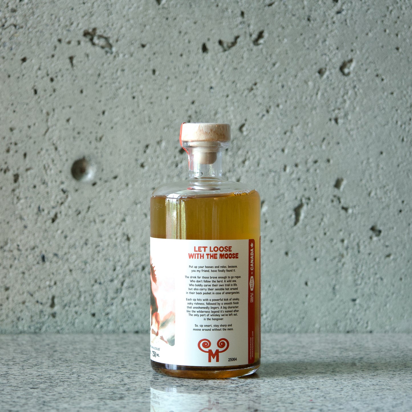 Label side of bottle of Mad Moose non-alcoholic whiskey