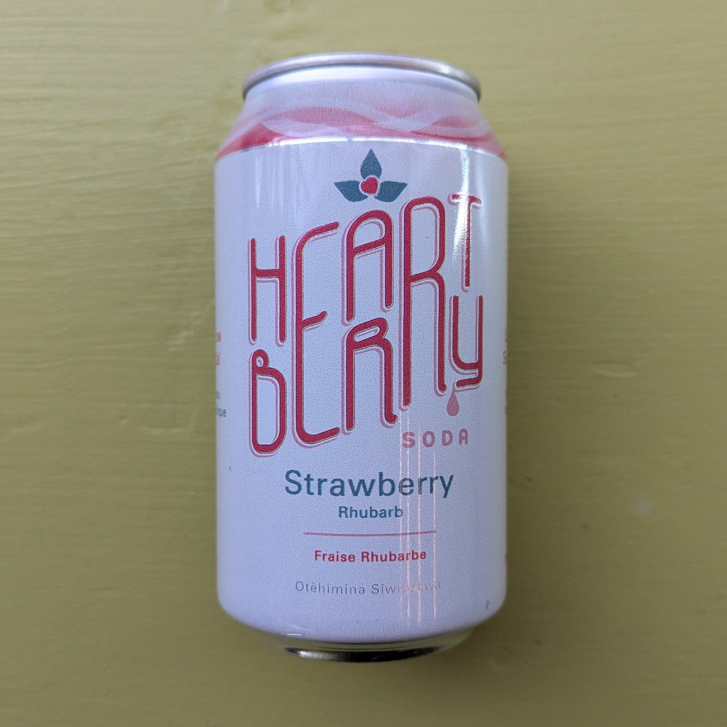 Can of Heart Berry Soda on a beige background