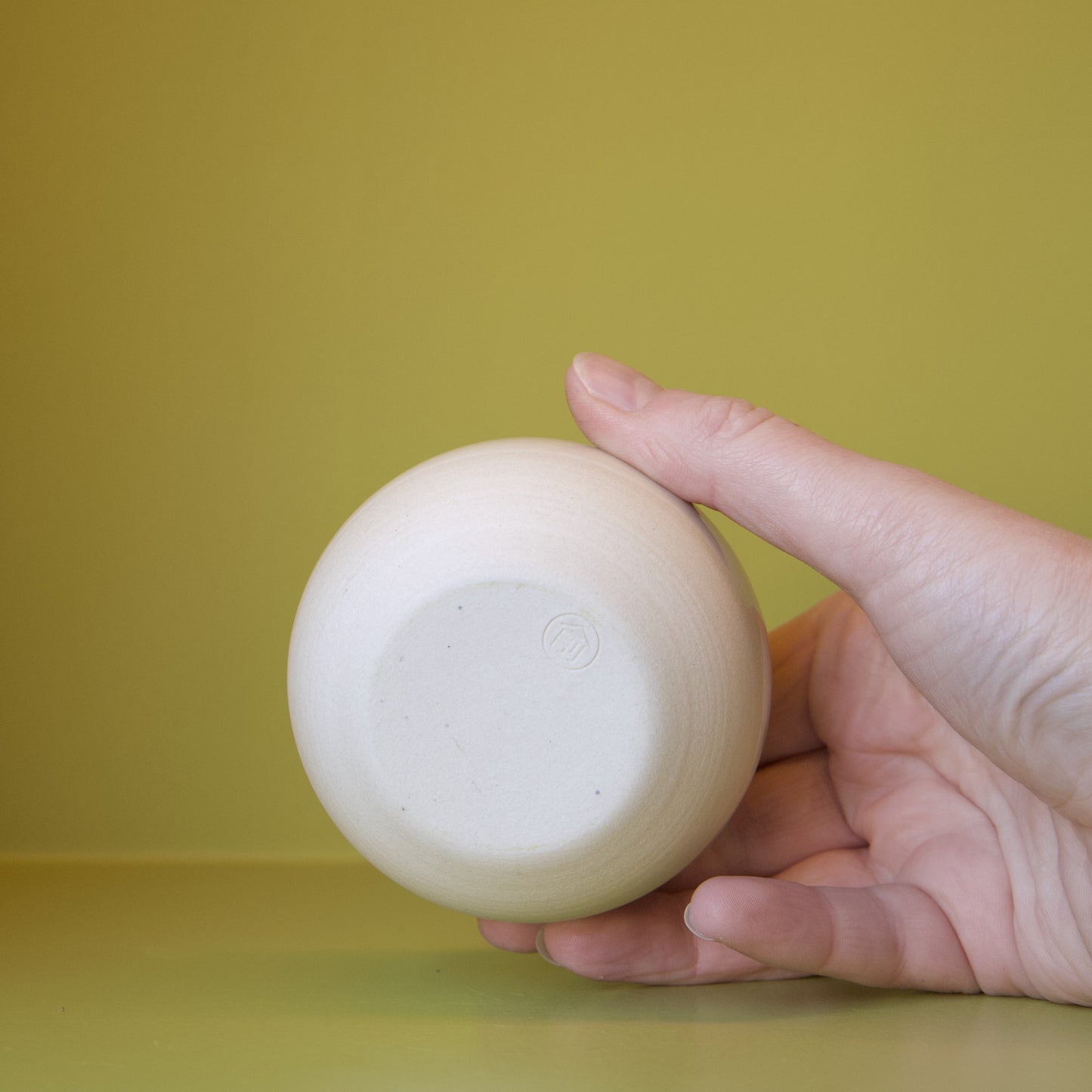 Cream Round Cup by Dustin Ryan Yu