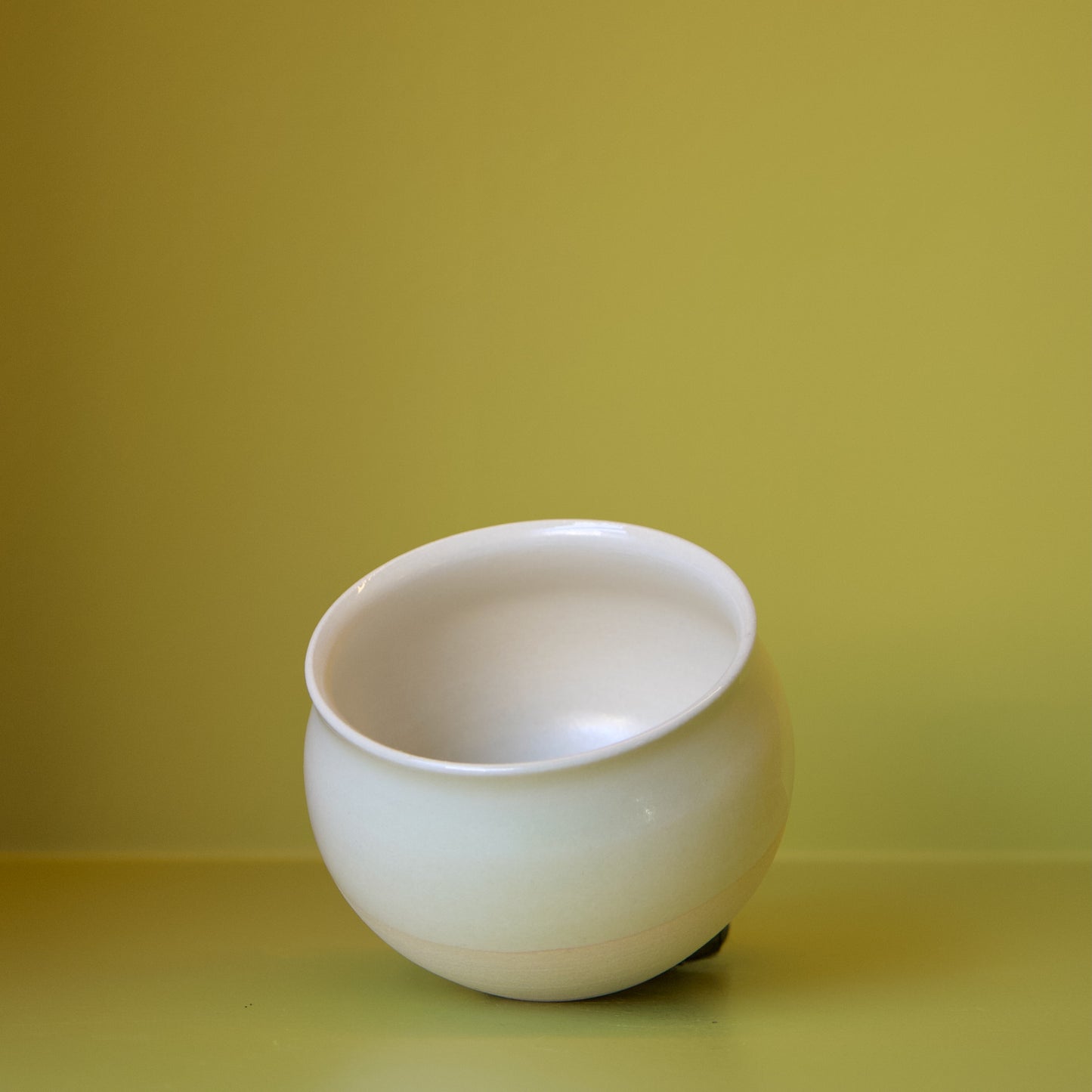Cream Round Cup by Dustin Ryan Yu