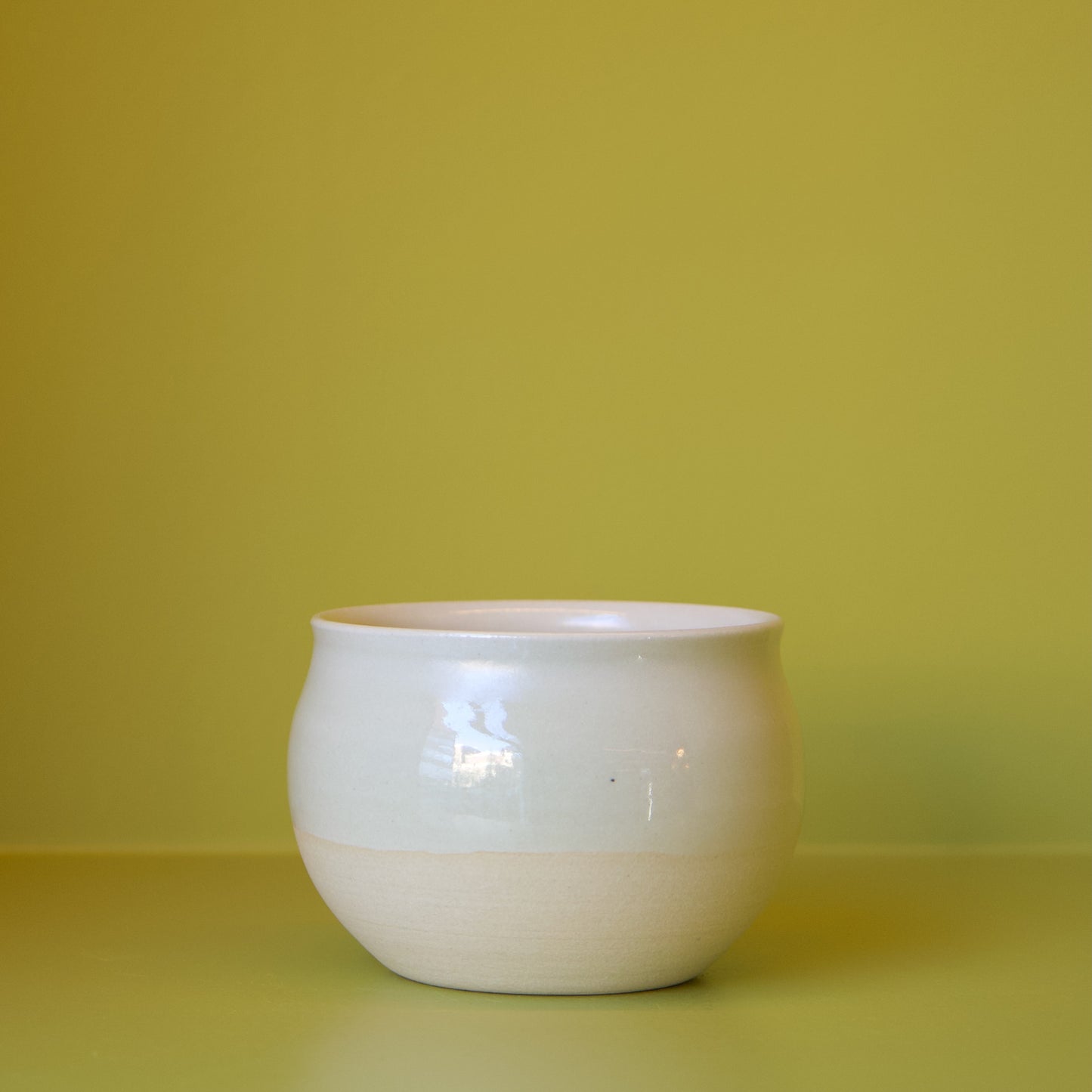 Cream Round Cup by Dustin Ryan Yu