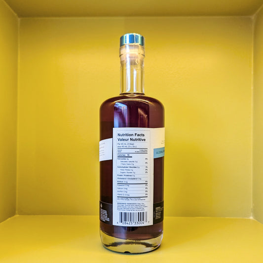 Empress 0.0 Indigi non-alcoholic gin style spirit back side of bottle with nutritional information (very low calories, zero alcohol).